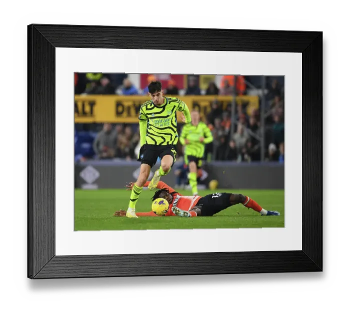 Framed Print : Havertz Surges Past Luton's Kabore: Arsenal vs Luton Town, Premier League 2023-24 Framed Print : Havertz Surges Past Luton's Kabore: Arsenal vs Luton Town, Premier League 2023-24