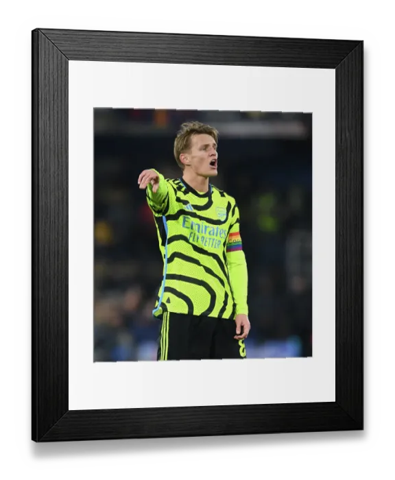 Framed Print : Martin Odegaard Shines: Arsenal's Midfield Genius Guides Team to Premier League Win over Luton Town, 2023-24 Season