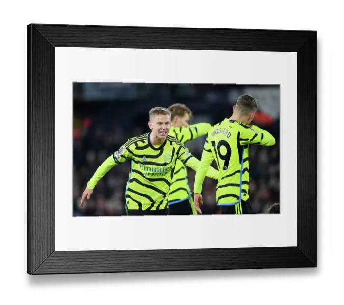 Framed Print : Arsenal's Zinchenko Shakes Hands with Trossard: Luton Town vs Arsenal, Premier League 2023-24