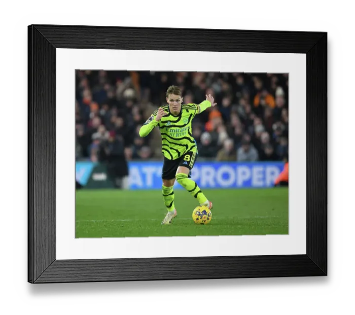 Framed Print : Martin Odegaard Shines: Arsenal's Dominant Display at Luton Town, Premier League 2023-24