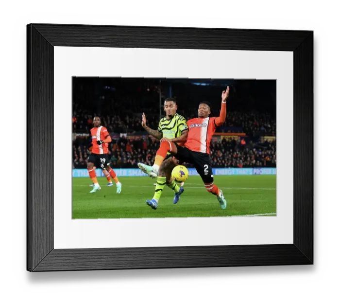 Framed Print : Gabriel Jesus vs Gabriel Osho: Intense Clash in Luton Town vs Arsenal FC Premier League Match, 2023-24