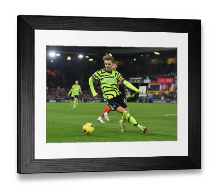 Framed Print : Martin Odegaard's Midfield Masterclass: Arsenal's Win Against Luton Town (2023-24) Framed Print : Martin Odegaard's Midfield Masterclass: Arsenal's Win Against Luton Town (2023-24)