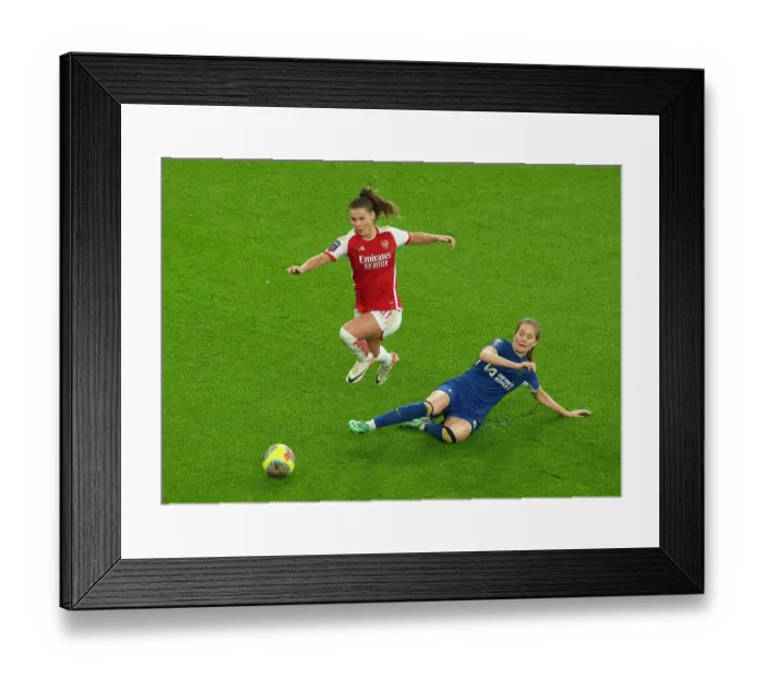 Framed Print : Arsenal vs. Chelsea: Clash in the Barclays Women's Super League (2023-24) - Pelova Leaps Over Nusken