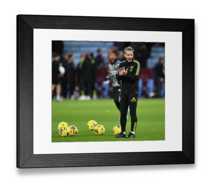 Framed Print : Arsenal Coach Albert Stuivenberg Motivates Team During Warm-up at Aston Villa, Premier League 2023-24