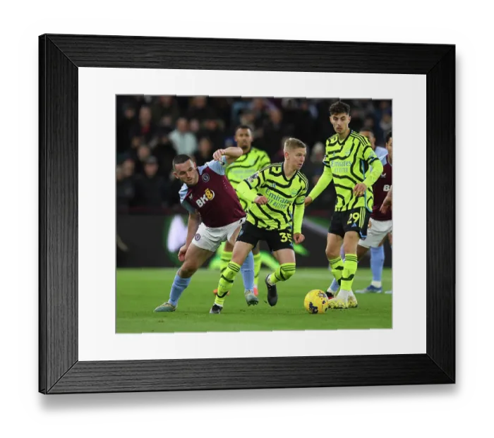 Framed Print : Clash at Villa Park: Arsenal's Zinchenko Faces Off Against McGinn Framed Print : Clash at Villa Park: Arsenal's Zinchenko Faces Off Against McGinn