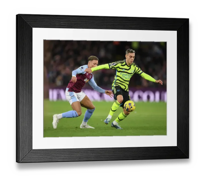 Framed Print : Arsenal's Trossard Thwarted by Villa's Cash in Intense Aston Villa vs. Arsenal Clash (2023-24 Premier League) Framed Print : Arsenal's Trossard Thwarted by Villa's Cash in Intense Aston Villa vs. Arsenal Clash (2023-24 Premier League)