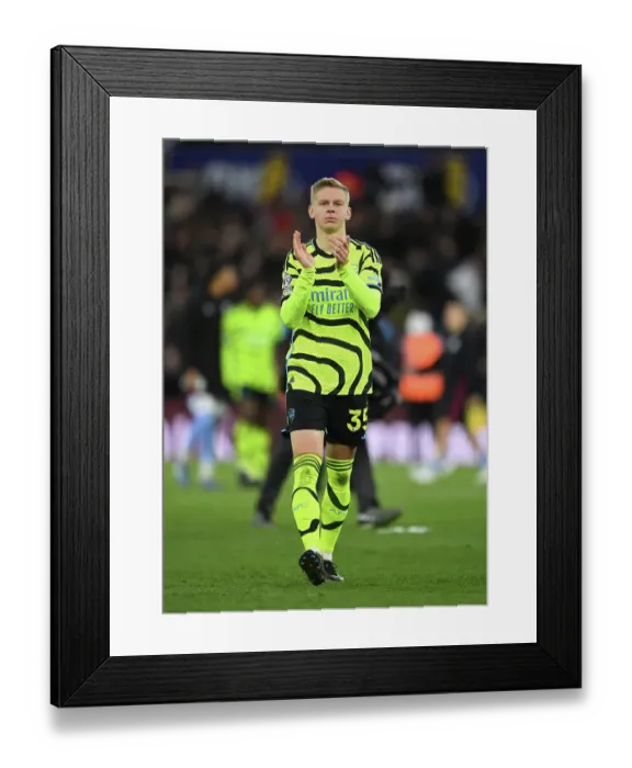 Framed Print : Arsenal's Oleksandr Zinchenko Celebrates with Fans after Aston Villa Victory (2023-24)