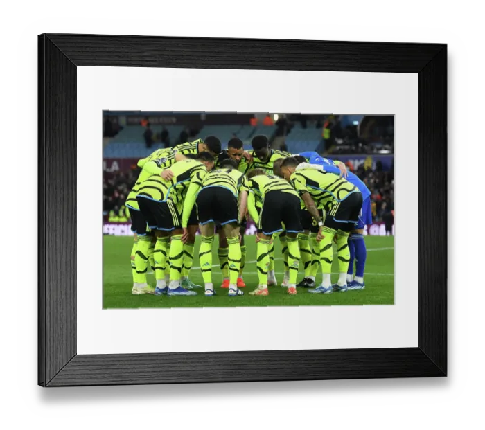 Framed Print : Arsenal's Half-Time Huddle: Aston Villa vs Arsenal, Premier League 2023-24