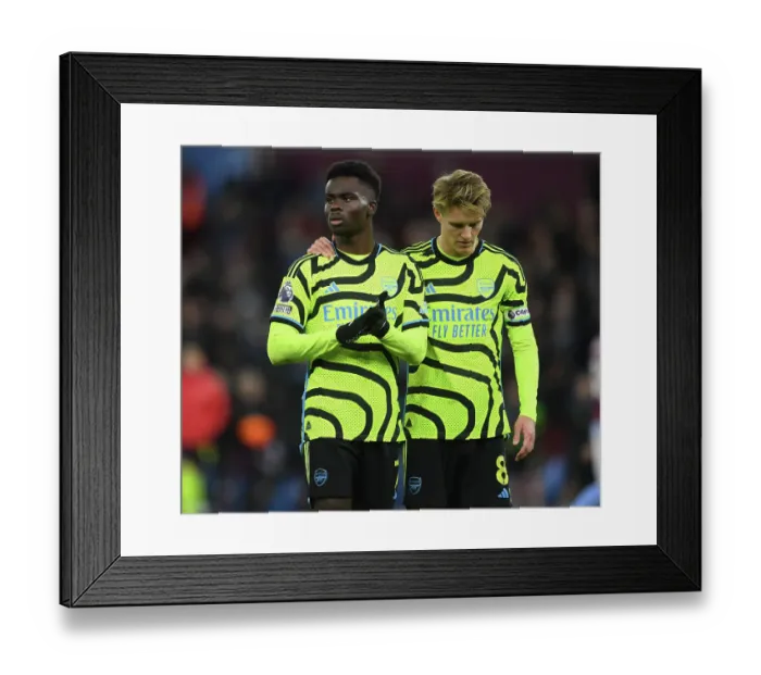 Framed Print : Dejected Arsenal Duo: Aston Villa Outshines Gunners in 2023-24 Premier League Clash