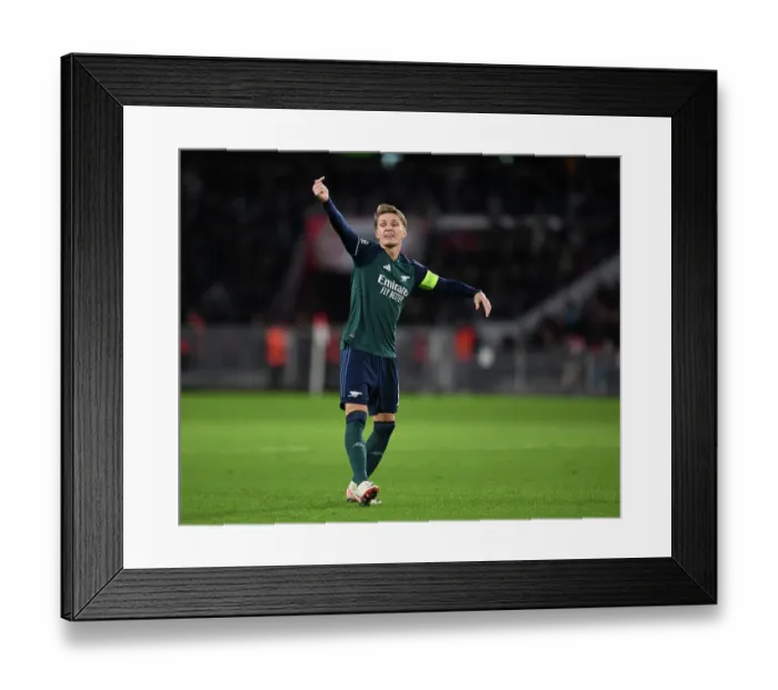 Framed Print : Martin Odegaard Faces PSV Eindhoven with Arsenal in Champions League Group B (2023-24)
