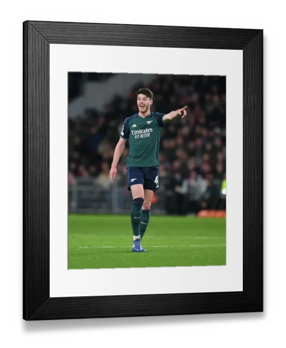 Framed Print : Arsenal's Declan Rice Faces Off Against PSV Eindhoven in Champions League Group Stage Match, 2023-24