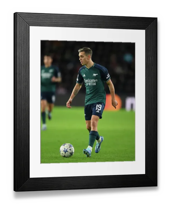 Framed Print : Arsenal's Leandro Rossi Faces Off Against PSV Eindhoven in Champions League Group Stage Clash Framed Print : Arsenal's Leandro Rossi Faces Off Against PSV Eindhoven in Champions League Group Stage Clash