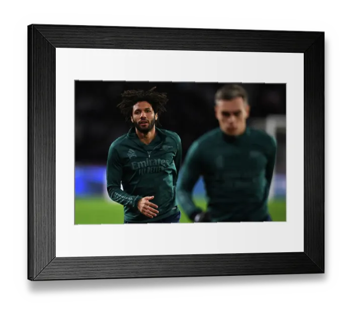 Framed Print : Arsenal's Mohamed Elneny Warms Up Ahead of PSV Eindhoven Clash in 2023-24 UEFA Champions League Framed Print : Arsenal's Mohamed Elneny Warms Up Ahead of PSV Eindhoven Clash in 2023-24 UEFA Champions League