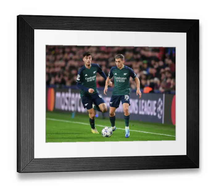 Framed Print : Arsenal's Trossard Dashes Through PSV Eindhoven's Defense in 2023-24 UEFA Champions League Clash