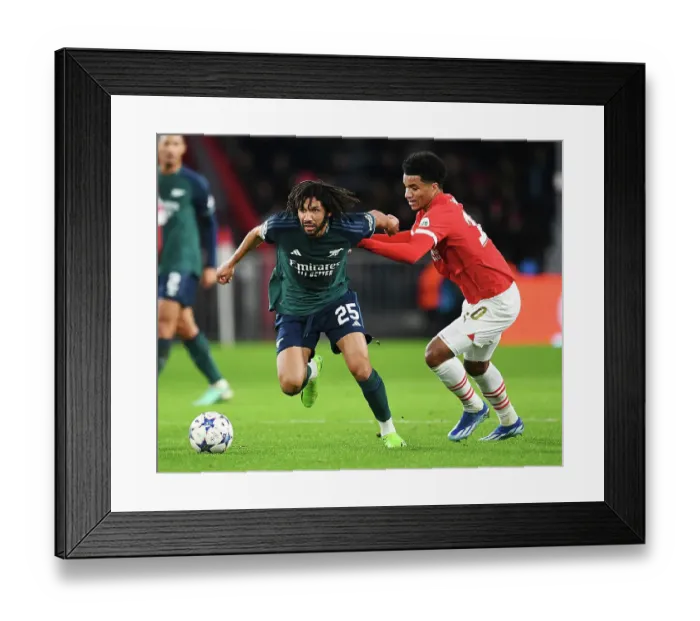 Framed Print : Battle for Possession: Mohamed Elneny vs. Malik Tillman - PSV Eindhoven vs. Arsenal FC, UEFA Champions League 2023 / 24 Framed Print : Battle for Possession: Mohamed Elneny vs. Malik Tillman - PSV Eindhoven vs. Arsenal FC, UEFA Champions League 2023 / 24