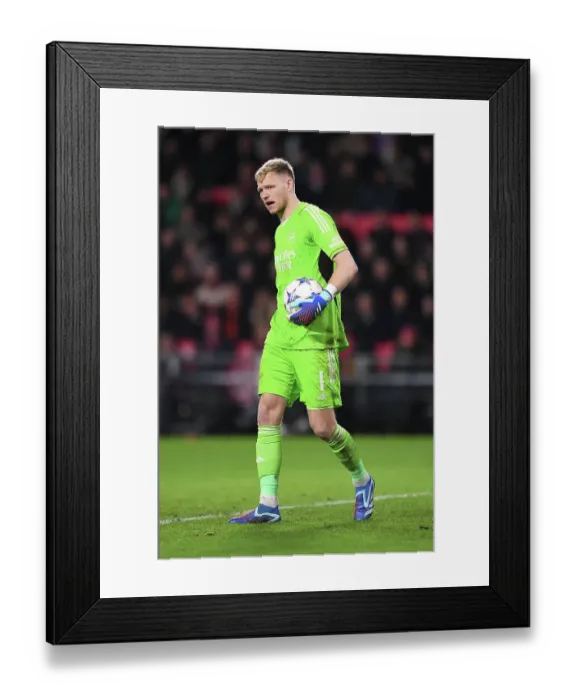 Framed Print : Arsenal's Ramsdale Amidst Tension: Focused Performance in PSV Eindhoven's Champions League Clash Framed Print : Arsenal's Ramsdale Amidst Tension: Focused Performance in PSV Eindhoven's Champions League Clash