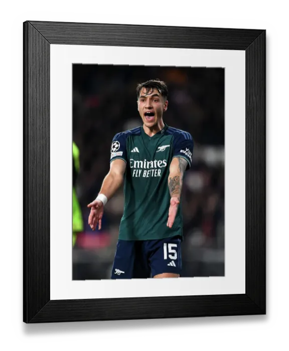 Framed Print : Arsenal's Jakub Kiwior Reacts During PSV Eindhoven Clash in 2023-24 UEFA Champions League Framed Print : Arsenal's Jakub Kiwior Reacts During PSV Eindhoven Clash in 2023-24 UEFA Champions League