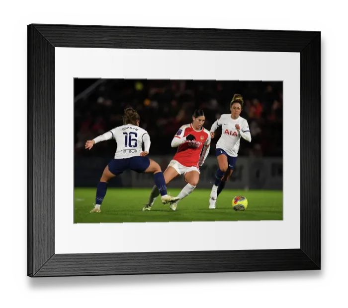 Framed Print : Arsenal's Kyra Cooney-Cross Fights for Possession in FA WSL Cup Clash Against Tottenham Hotspur