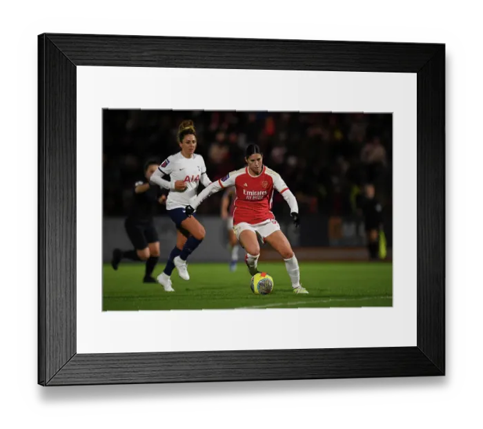 Framed Print : Arsenal Women vs. Tottenham Hotspur Women: Battle in the Conti Cup (2023-24) - Kyra Cooney-Cross of Arsenal Outruns Ramona Petzelberger of Tottenham Hotspur