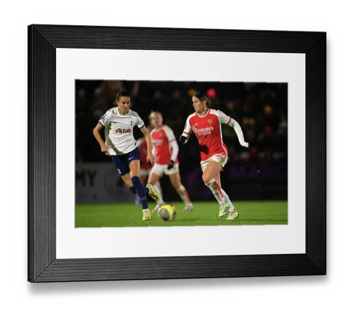 Framed Print : Arsenal vs. Tottenham Women's Clash in FA WSL Cup: Kyra Cooney-Cross Fights Past Rosella Ayane