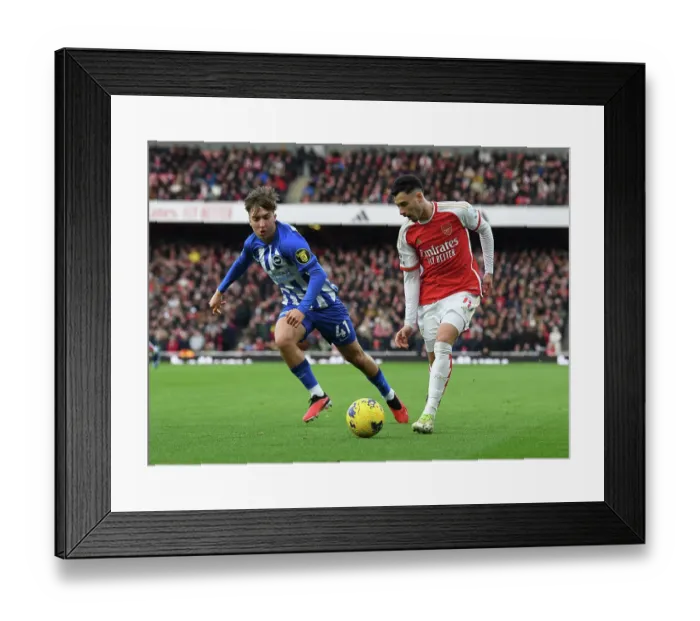 Framed Print : Martinelli vs. Hinshelwood: A Fiery Encounter in Arsenal's Battle Against Brighton (2023-24 Premier League)