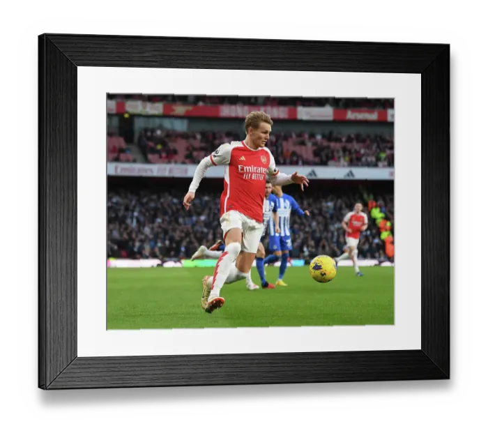 Framed Print : Arsenal's Martin Odegaard Shines in Arsenal FC vs Brighton & Hove Albion (2023-24)