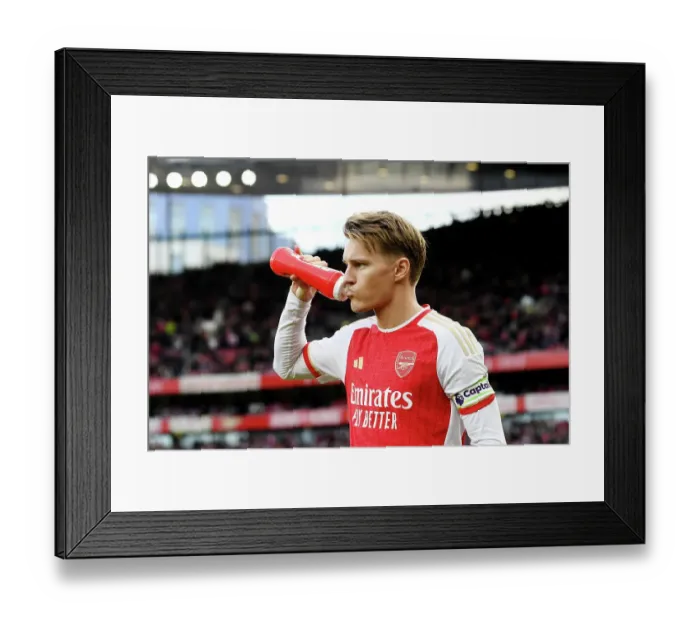 Framed Print : Arsenal's Martin Odegaard Pre-Match with PRIME Bottle vs Brighton & Hove Albion (2023-24) Framed Print : Arsenal's Martin Odegaard Pre-Match with PRIME Bottle vs Brighton & Hove Albion (2023-24)