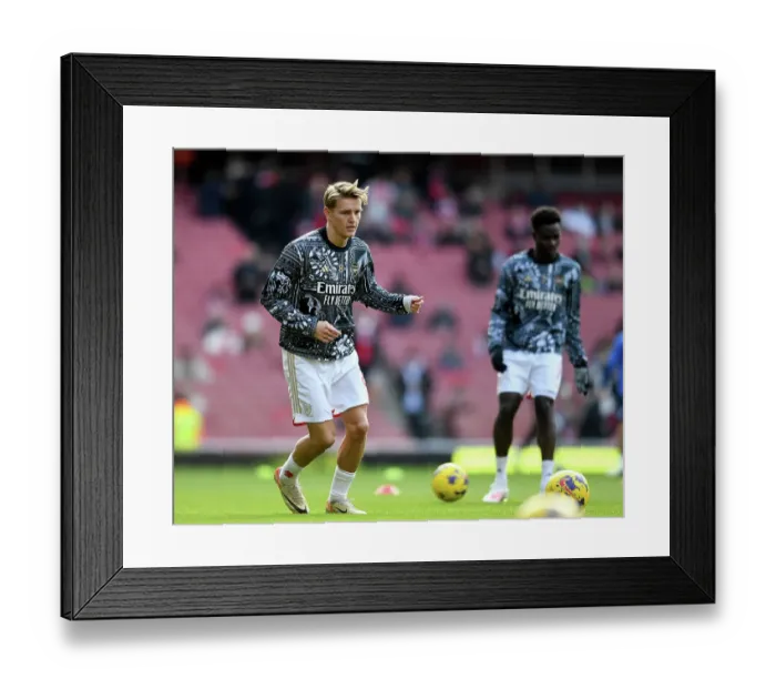 Framed Print : Arsenal's Martin Odegaard Prepares: Arsenal vs Brighton & Hove Albion (2023-24)