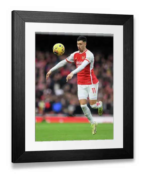 Framed Print : Martinelli's Star Performance: Arsenal Triumphs Over Brighton in Premier League Clash (2023-24)