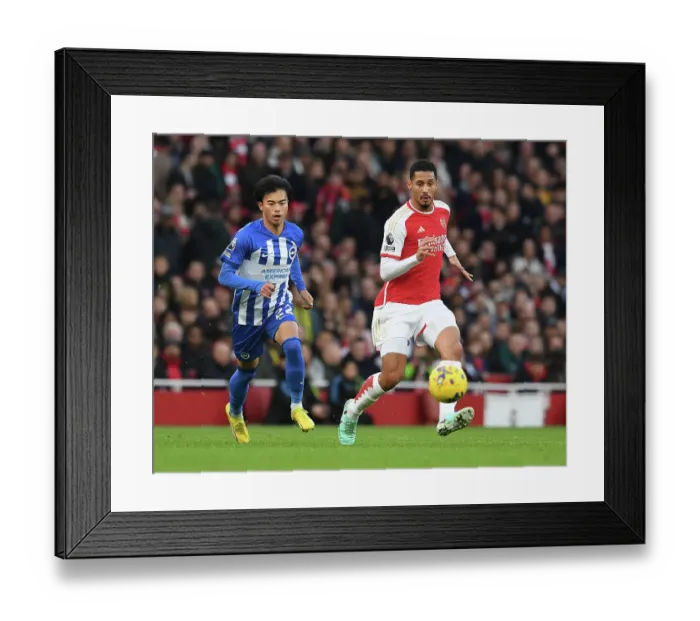Framed Print : Arsenal's Saliba Chased by Mitoma in Intense Arsenal v Brighton Clash (2023-24) Framed Print : Arsenal's Saliba Chased by Mitoma in Intense Arsenal v Brighton Clash (2023-24)