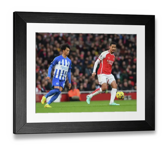 Framed Print : Arsenal vs Brighton: Saliba Chases Down Mitoma in Premier League Clash (2023-24) Framed Print : Arsenal vs Brighton: Saliba Chases Down Mitoma in Premier League Clash (2023-24)