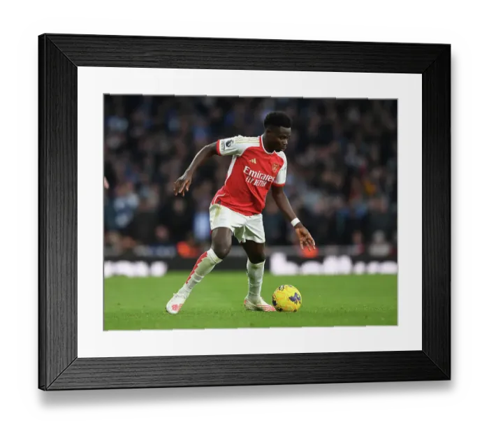 Framed Print : Arsenal's Bukayo Saka in Action against Brighton & Hove Albion (2023-24)