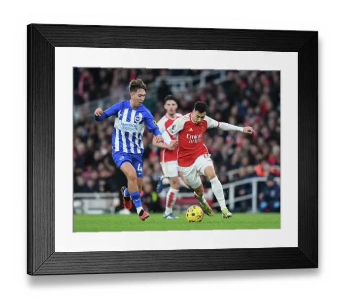 Framed Print : Arsenal vs Brighton: Gabriel Magalhães Under Pressure in 2023-24 Premier League Clash