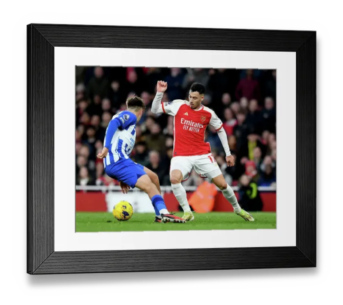 Framed Print : Arsenal vs Brighton: Martinelli Fights for Possession in 2023-24 Premier League Clash
