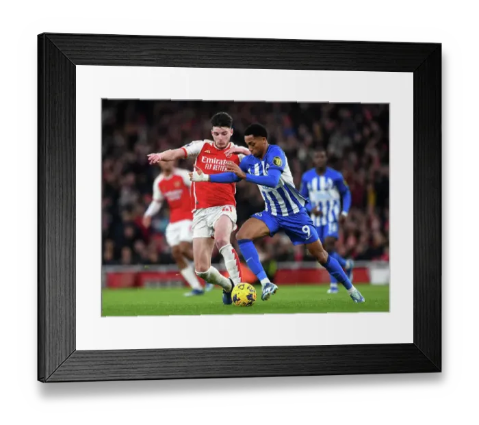 Framed Print : Arsenal's Declan Rice Tackles Joao Pedro in Premier League Clash Against Brighton & Hove Albion (2023-24)