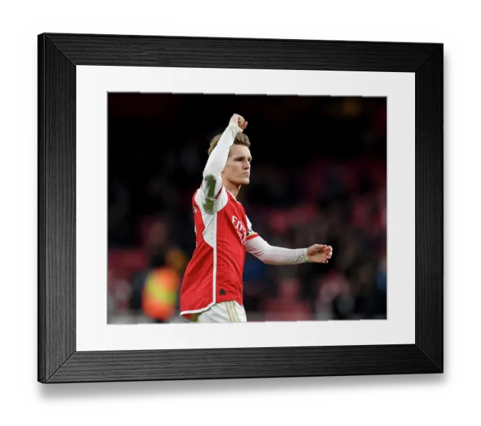 Framed Print : Martin Odegaard Scores the Winning Goal: Arsenal's Triumphant Victory Over Brighton (2023-24)