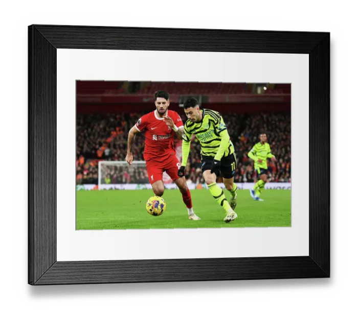 Framed Print : Martinelli vs. Liverpool: Intense Battle at Anfield, Premier League 2023-24 Framed Print : Martinelli vs. Liverpool: Intense Battle at Anfield, Premier League 2023-24