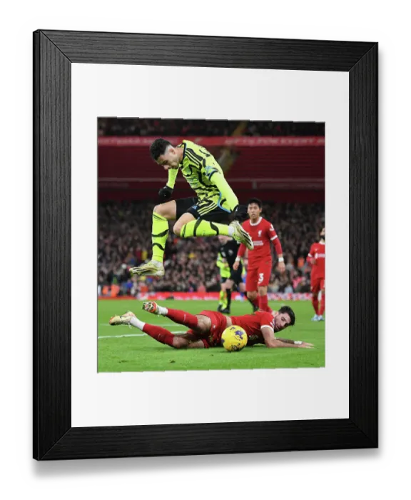 Framed Print : Martinelli Leaps Over Szoboszlai in Intense Liverpool vs. Arsenal Clash (2023-24) Framed Print : Martinelli Leaps Over Szoboszlai in Intense Liverpool vs. Arsenal Clash (2023-24)