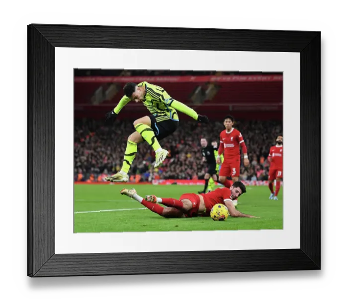 Framed Print : Martinelli Leaps Over Szoboszlai: Liverpool vs. Arsenal, Premier League 2023-24 Framed Print : Martinelli Leaps Over Szoboszlai: Liverpool vs. Arsenal, Premier League 2023-24