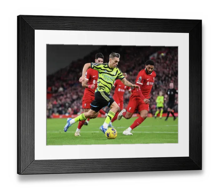 Framed Print : Arsenal vs. Liverpool: Trossard vs. Gomez - Premier League Clash at Anfield (2023-24) Framed Print : Arsenal vs. Liverpool: Trossard vs. Gomez - Premier League Clash at Anfield (2023-24)