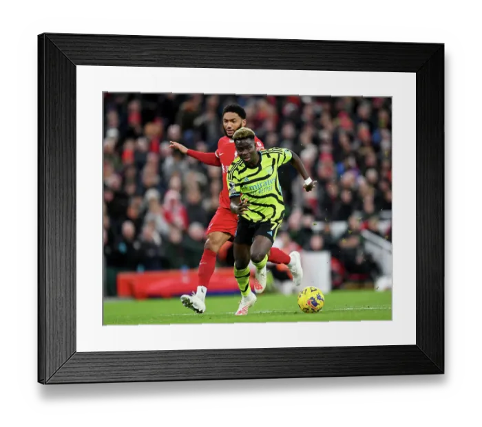 Framed Print : Saka vs Gomez: A Premier League Battle at Anfield - Liverpool vs Arsenal, 2023-24