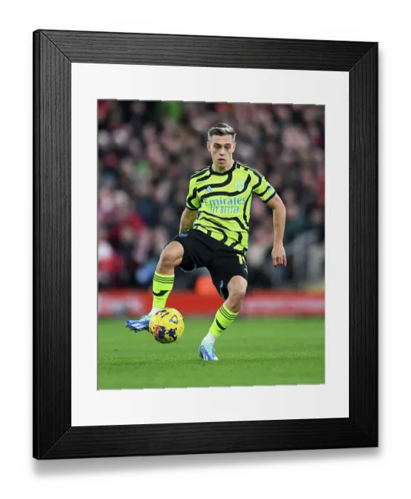 Framed Print : Arsenal's Trossard Faces Off Against Liverpool at Anfield (2023-24 Premier League)