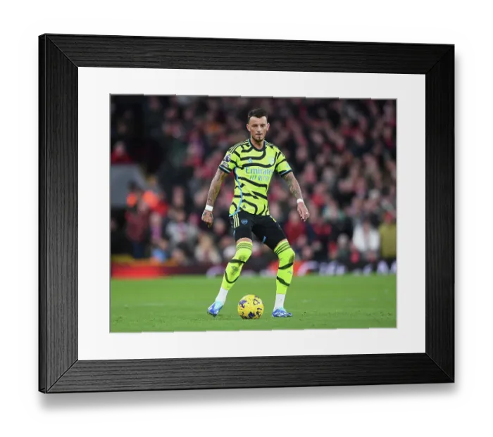 Framed Print : Arsenal's Trossard Goes Head-to-Head with Liverpool at Anfield (2023-24)