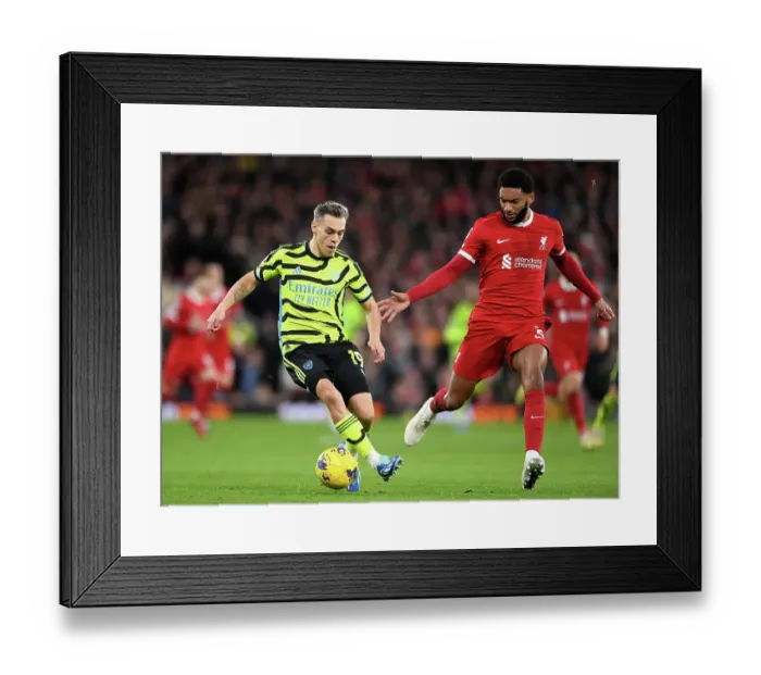 Framed Print : Leandro Trossard vs Joe Gomez: Intense Rivalry at Anfield - Premier League 2023-24