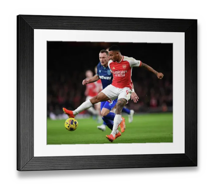 Framed Print : Intense Rivalry: Gabriel Jesus Stands Firm Against Coufal in Arsenal's Battle with West Ham (2023-24)