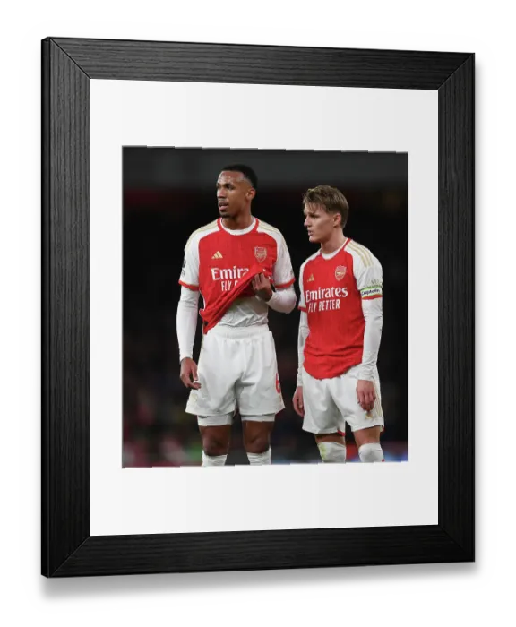 Framed Print : Magalhaes and Odegaard in Action: Arsenal's Winning Duo vs. West Ham United (2023-24)