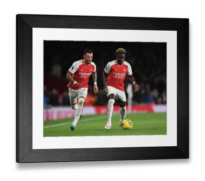 Framed Print : Arsenal's Saka and White in Action against West Ham United (2023-24) Framed Print : Arsenal's Saka and White in Action against West Ham United (2023-24)