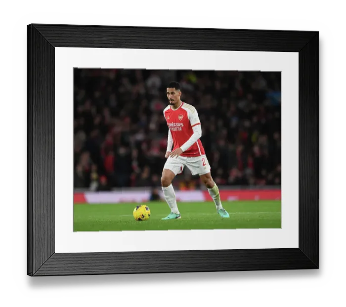 Framed Print : Arsenal's William Saliba Faces Off Against West Ham in 2023-24 Premier League Clash