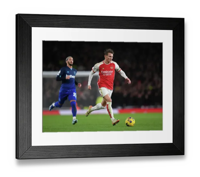 Framed Print : Martin Odegaard's Standout Display: Arsenal Triumphs Over West Ham United in Premier League Clash (2023-24) Framed Print : Martin Odegaard's Standout Display: Arsenal Triumphs Over West Ham United in Premier League Clash (2023-24)