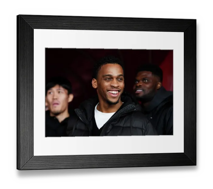 Framed Print : Arsenal's Jurrien Timber Gazes from the Tunnel Before Arsenal v West Ham United (2023-24)